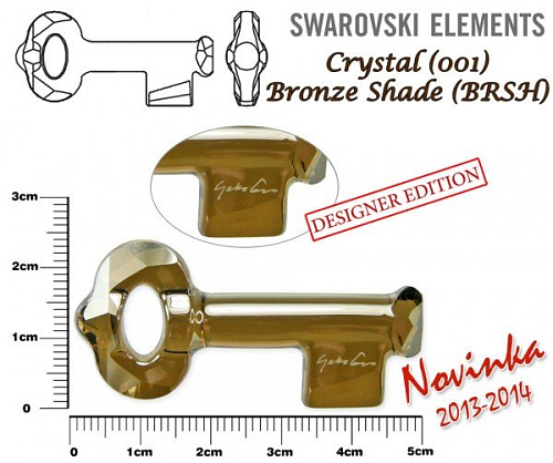 SWAROVSKI KEY to the Forest 6918 ( podpis YOKO ONO) barva Crystal BRONZE SHADE velikost 50mm.