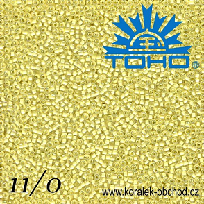 Korálky TOHO tvar ROUND (kulaté). Velikost 11/0. Barva č. 182-Inside-Color Luster Crystal/Opaque Yellow Lined . Balení 8g.